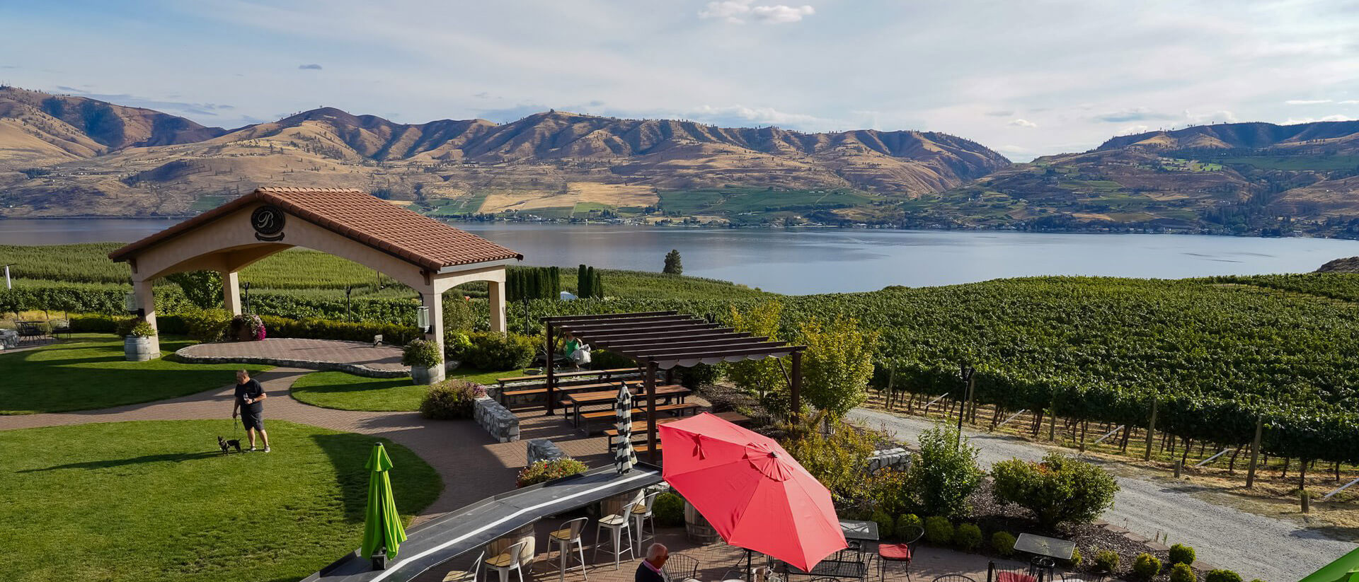Washington wine: People sit on a patio at a vineyard overlooking Lake Chelan