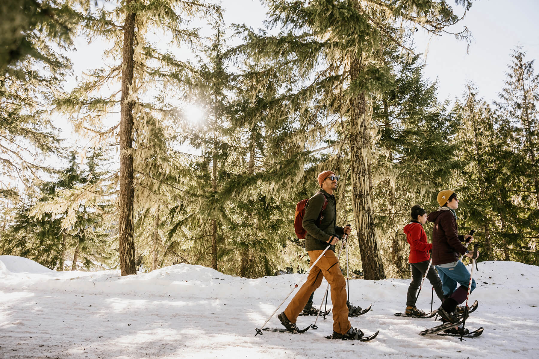 Friends snowshoeing in Salmon La Sac Sno-Park near Cle Elum, WA. 