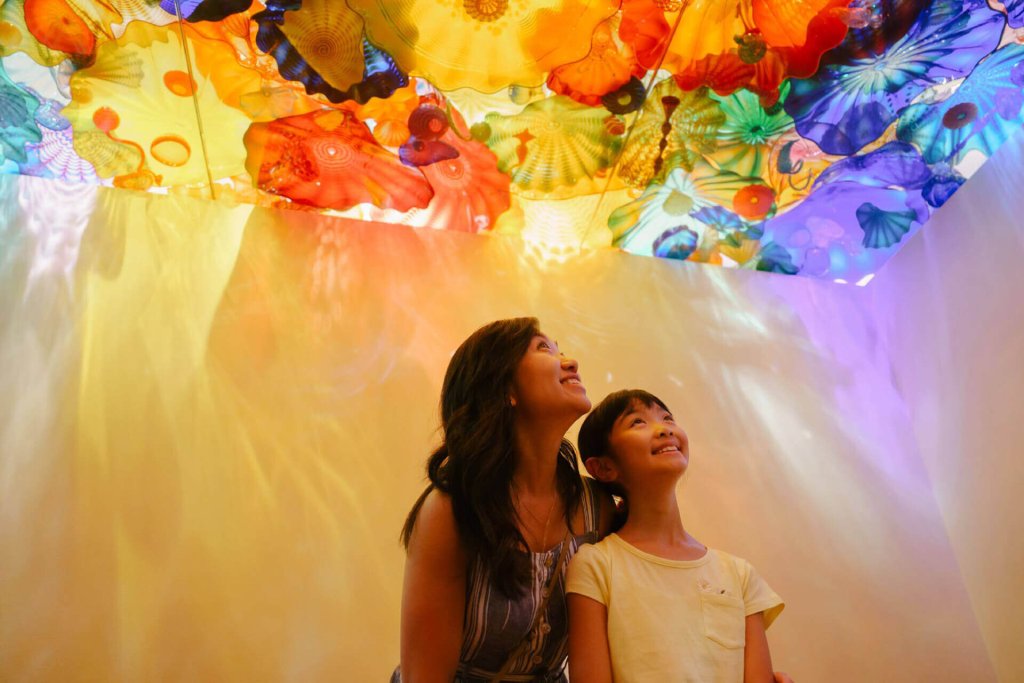 A mother and daughter visit Chihuly Garden and Class, one of Seattle's top indoor attractions.