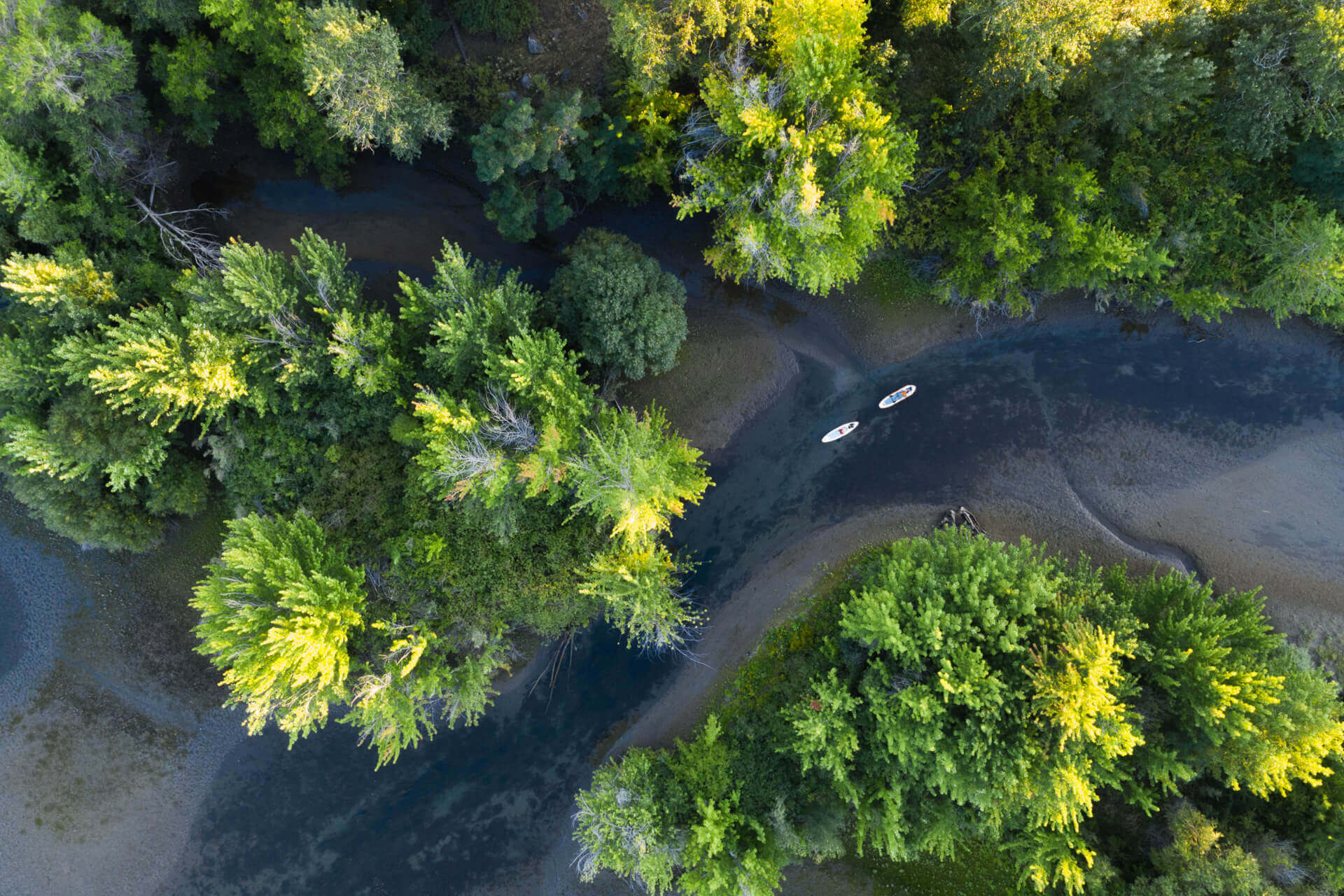 An aerial view shows paddlers on the Columbia River.