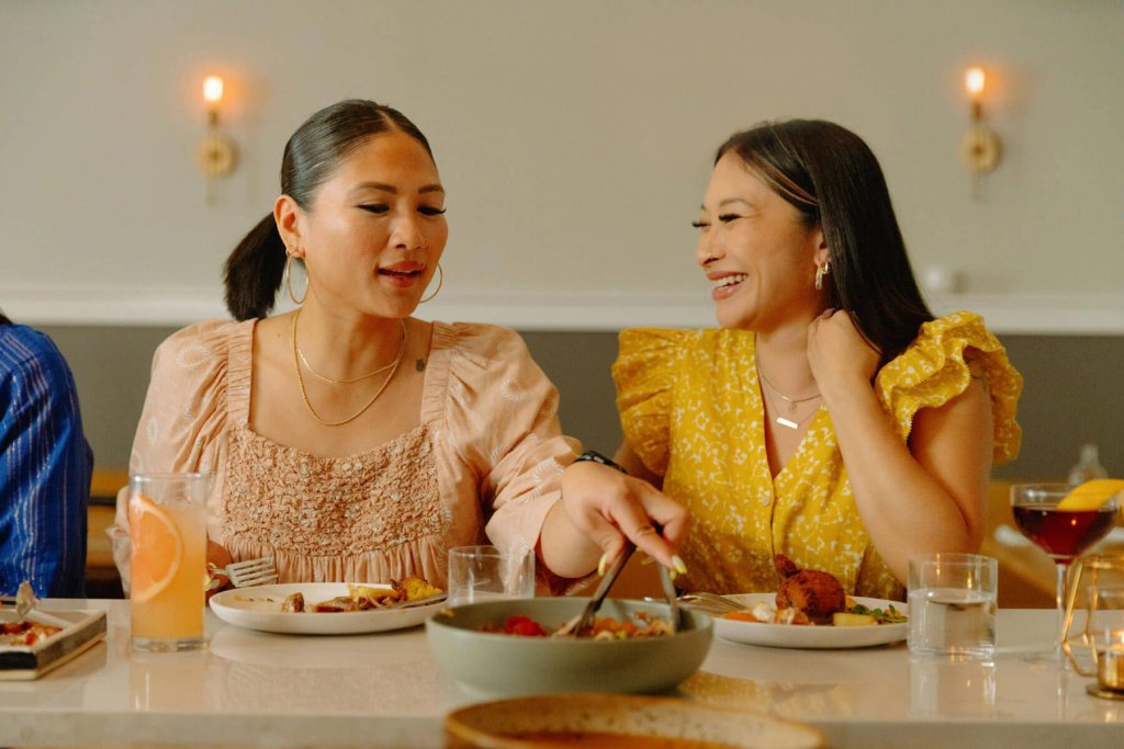 Two friends sharing a meal at Crafted in downtown Yakima. 